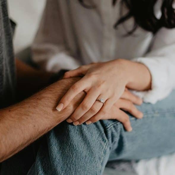 A couple holding each other