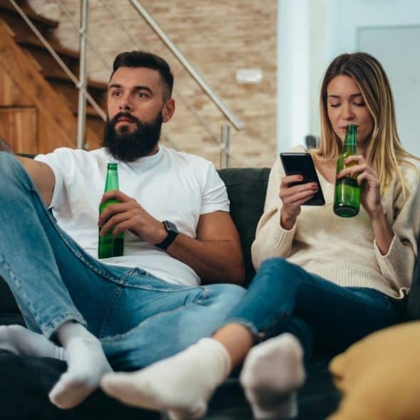 A man and a woman not talking to each other