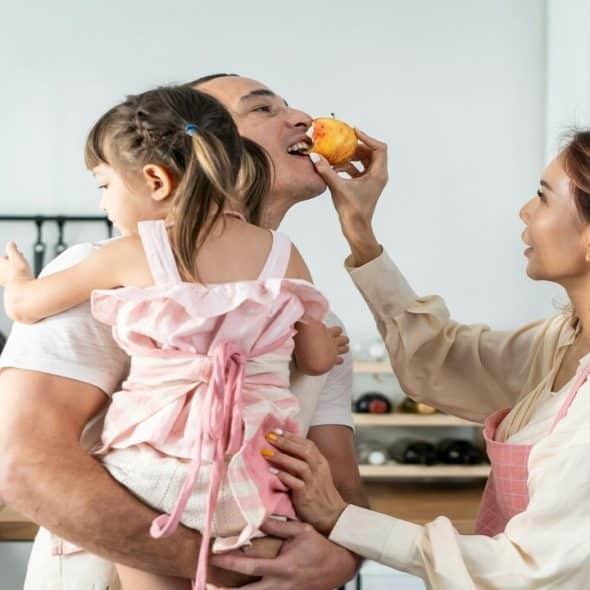 A couple spending time with their daughter