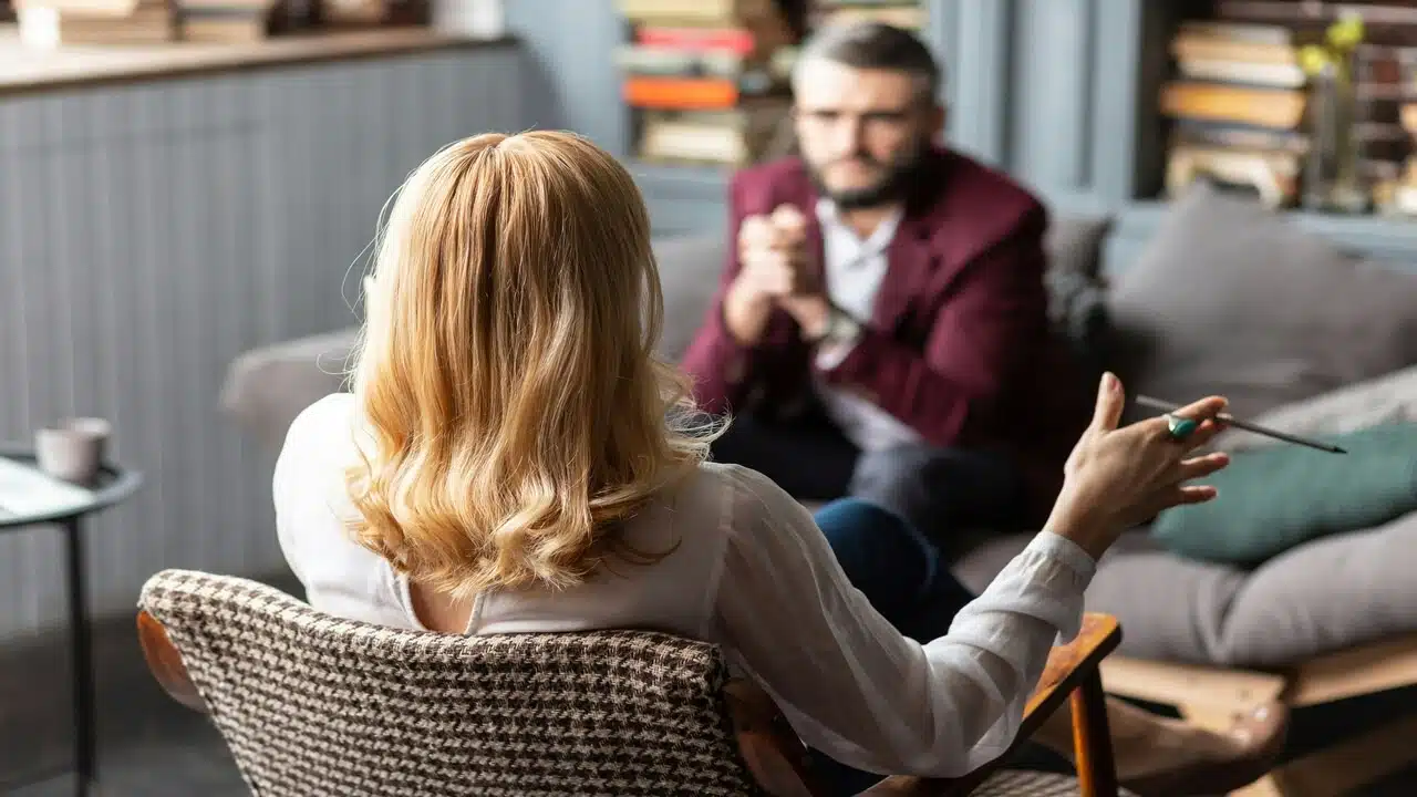 A couple talking in the home office