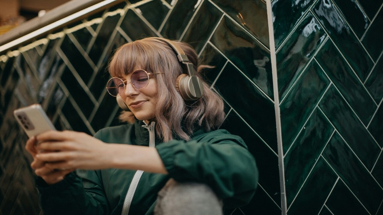 A woman listening to music