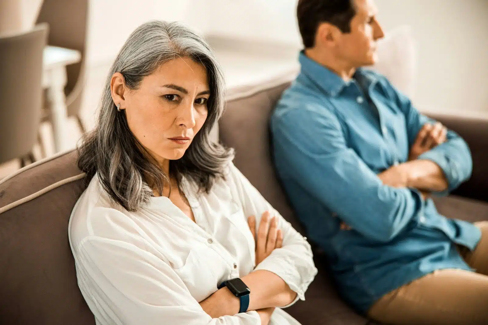 A man and a woman are not talking to each other