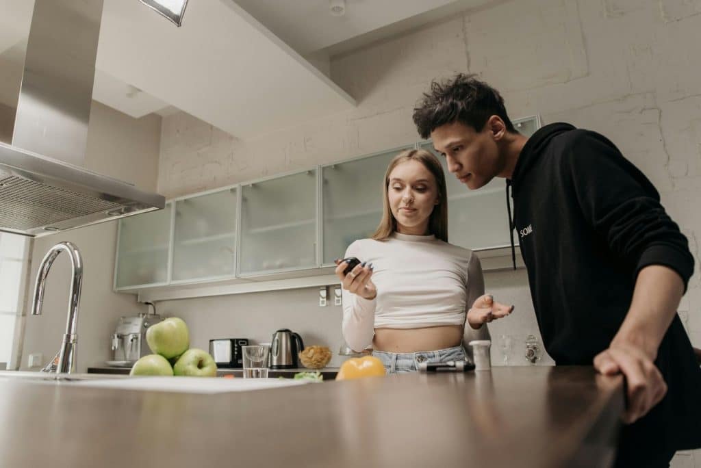 Woman explaining something to a man
