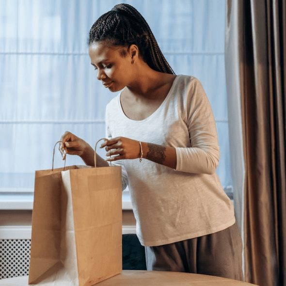 A woman checking what’s inside the bag