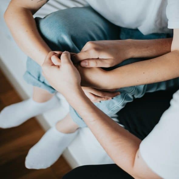 A couple holding hands