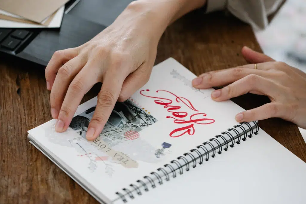 A woman browsing a scrap book