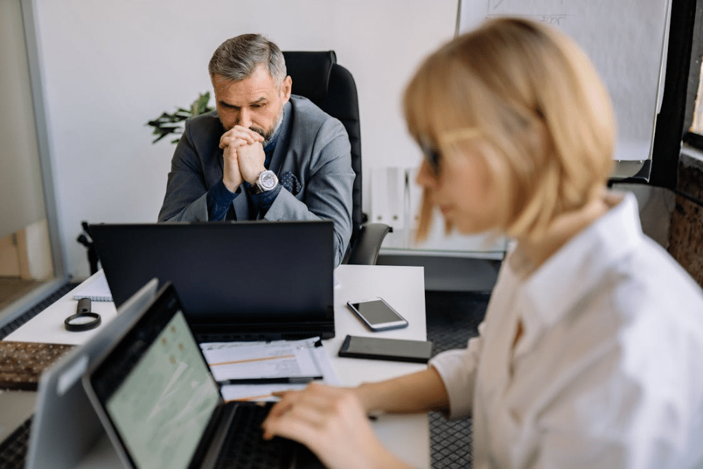 A man and a woman in an office