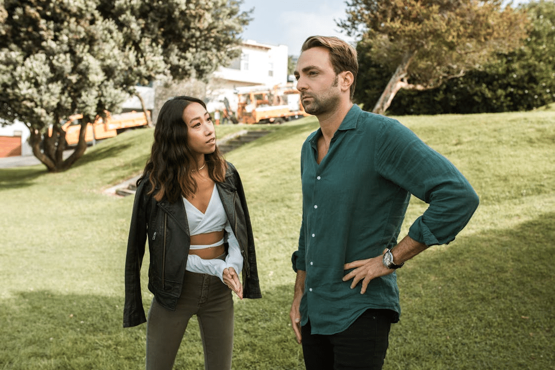 Couple having a misunderstanding outdoors