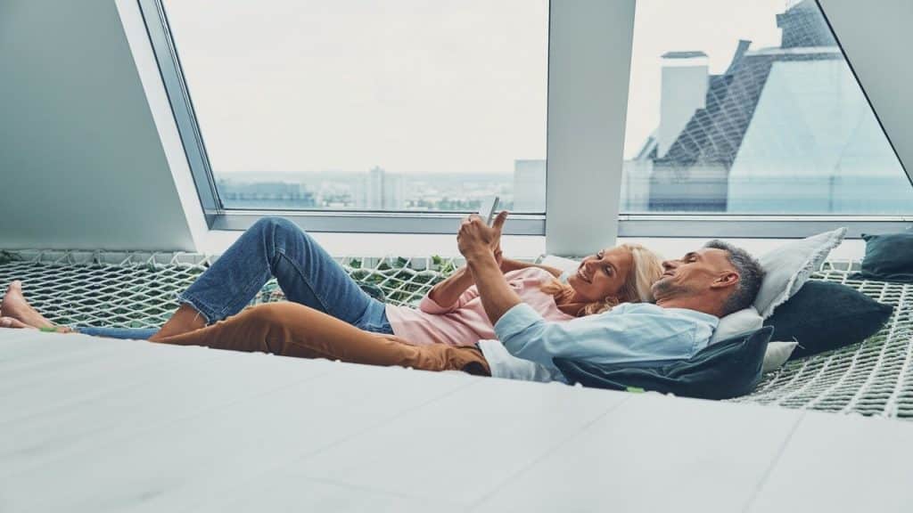 A couple relaxing on the hammock