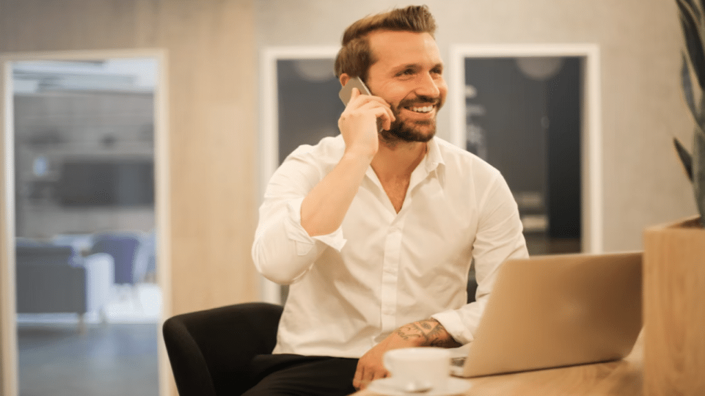 A man smiling at work