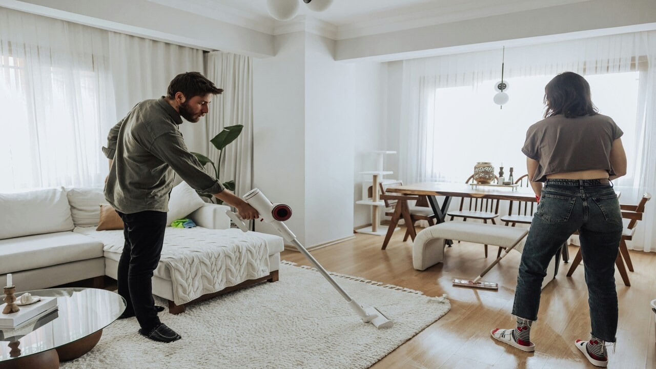 A couple cleaning together