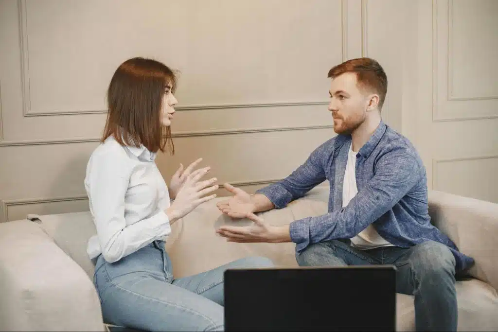 A man justifying something to woman
