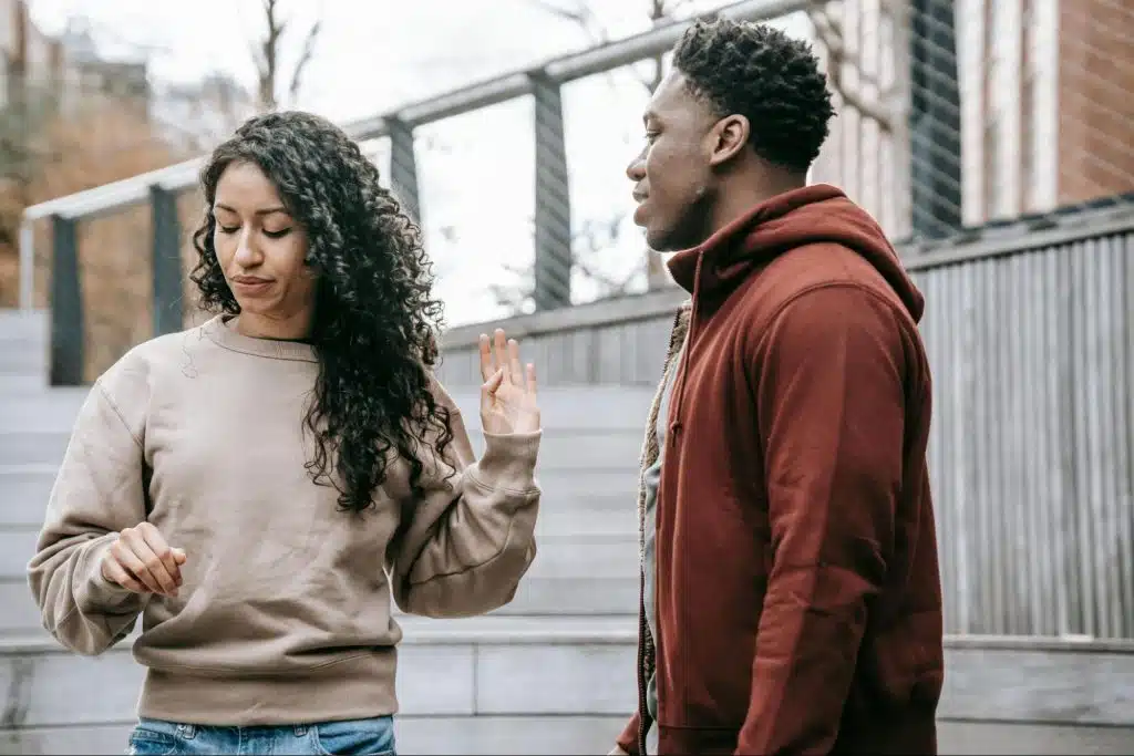 A man teasing a woman