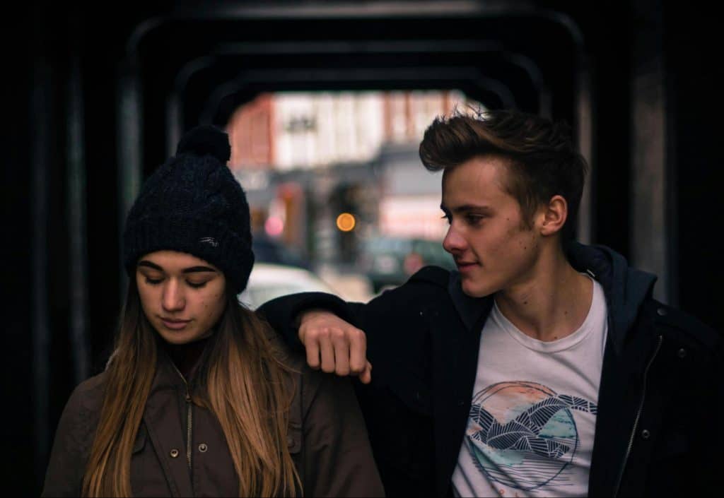 A man and woman talking