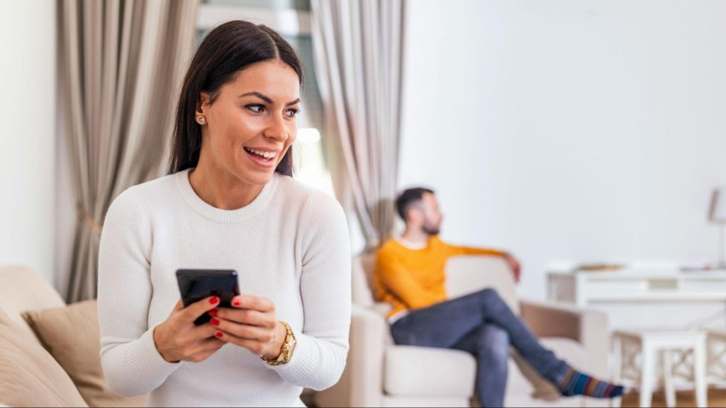 A woman messaging secretly