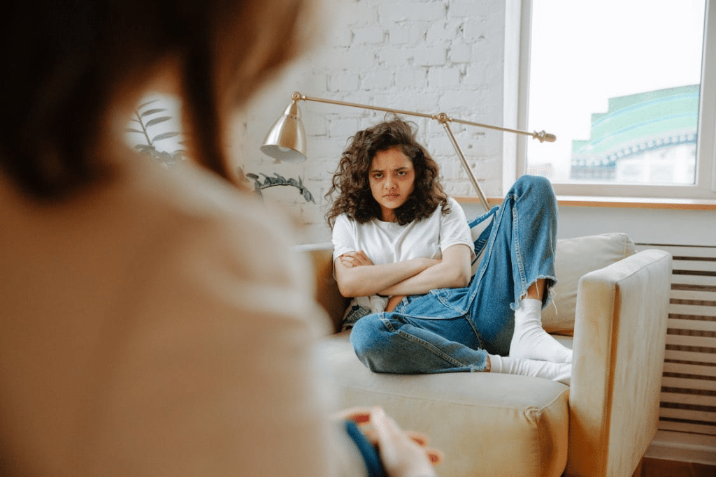 Upset Woman sitting on couch