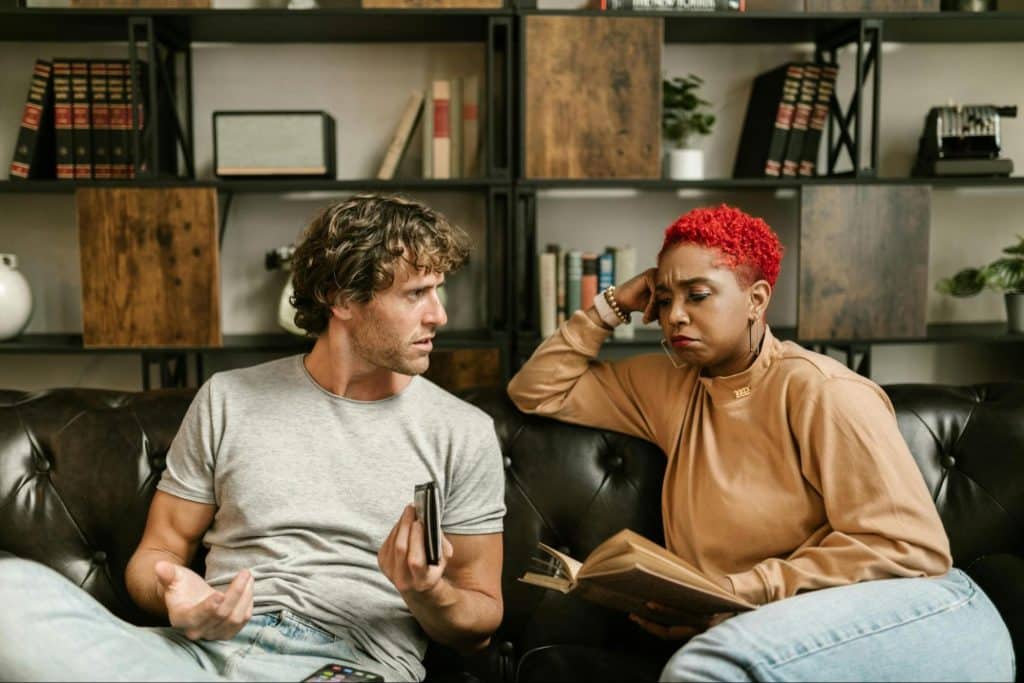 A man trying to talk to uninterested woman