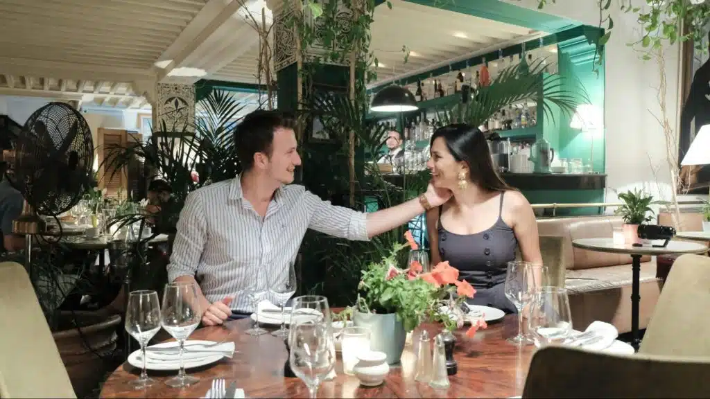 A man holding woman’s face