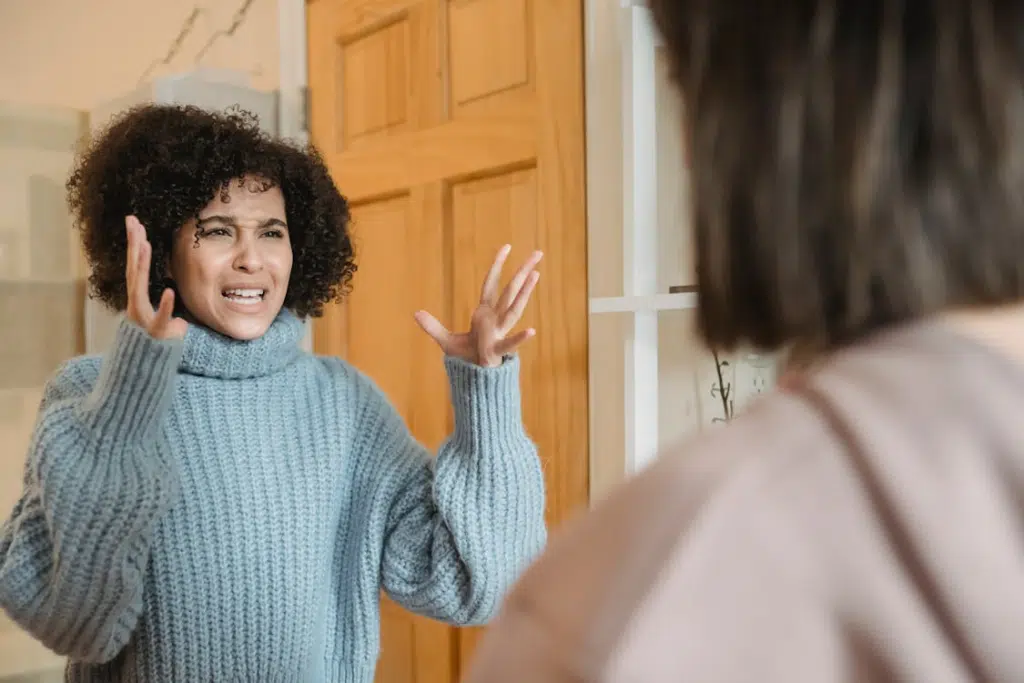 Upset woman in doorway