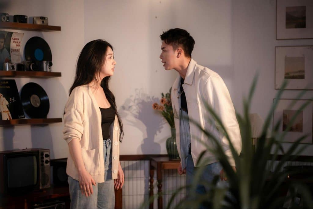A man and woman arguing outside