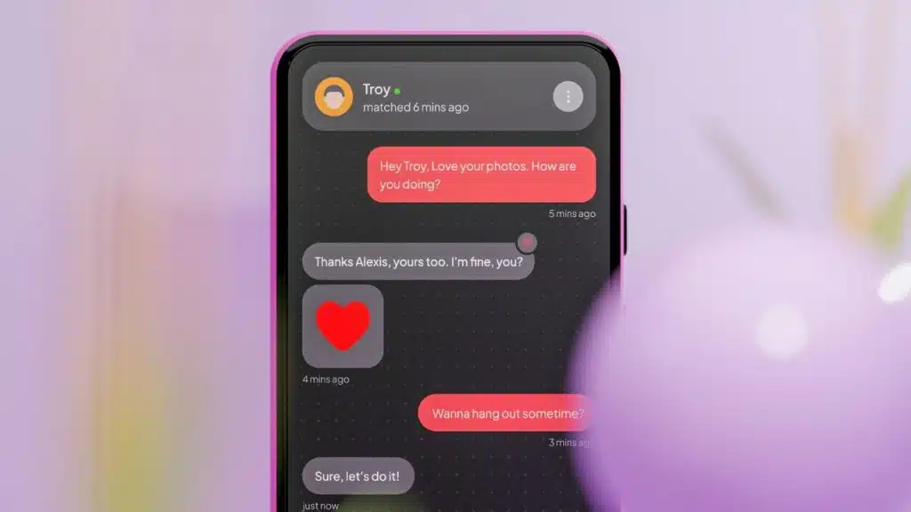 A close-up of a smartphone screen shows a text conversation with red and gray bubbles.