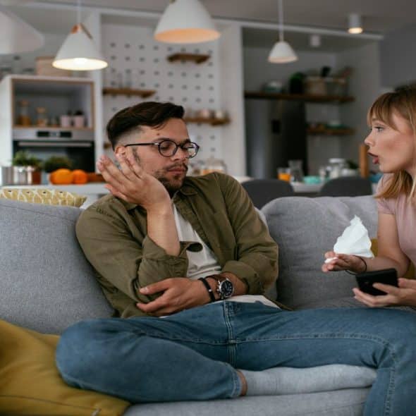 A couple having an argument at home