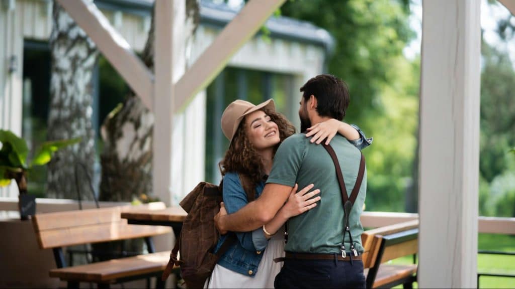 Woman hugging a man