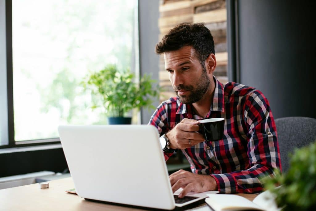 Alt text: confused man sitting alone