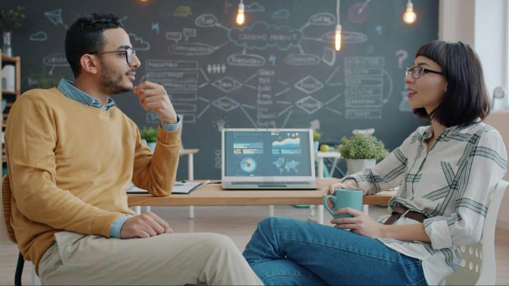 A man and woman talking