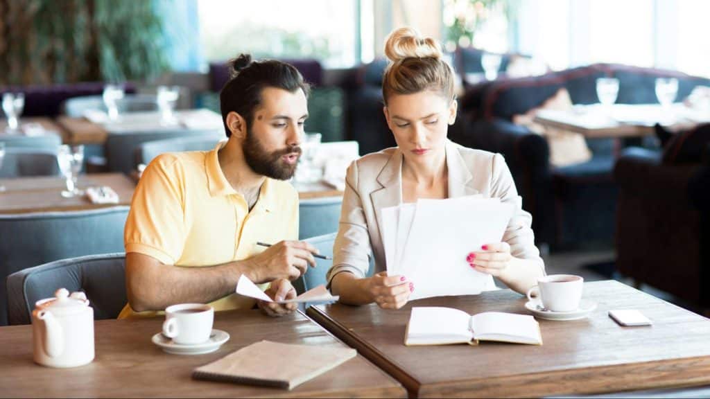 A man and woman talking