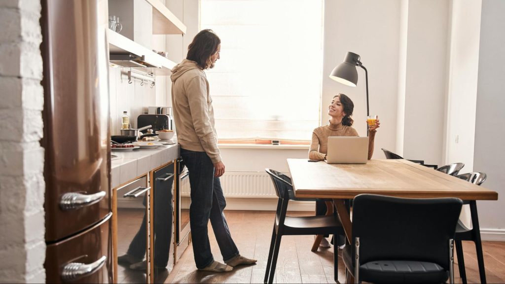 A man and woman being casual to each other