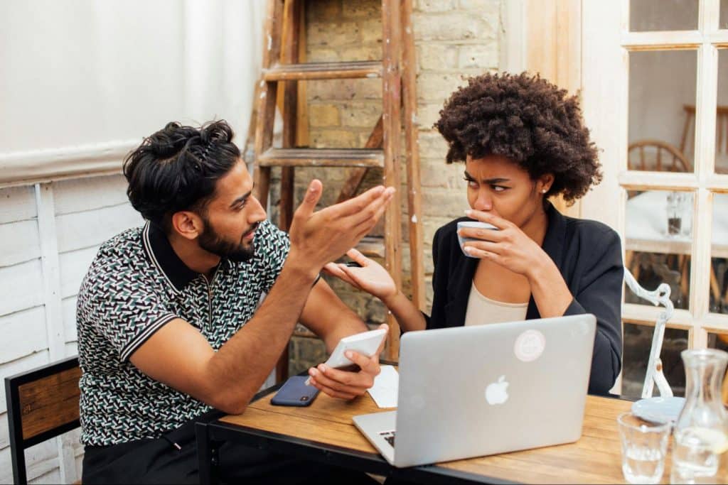 A man complaining to woman