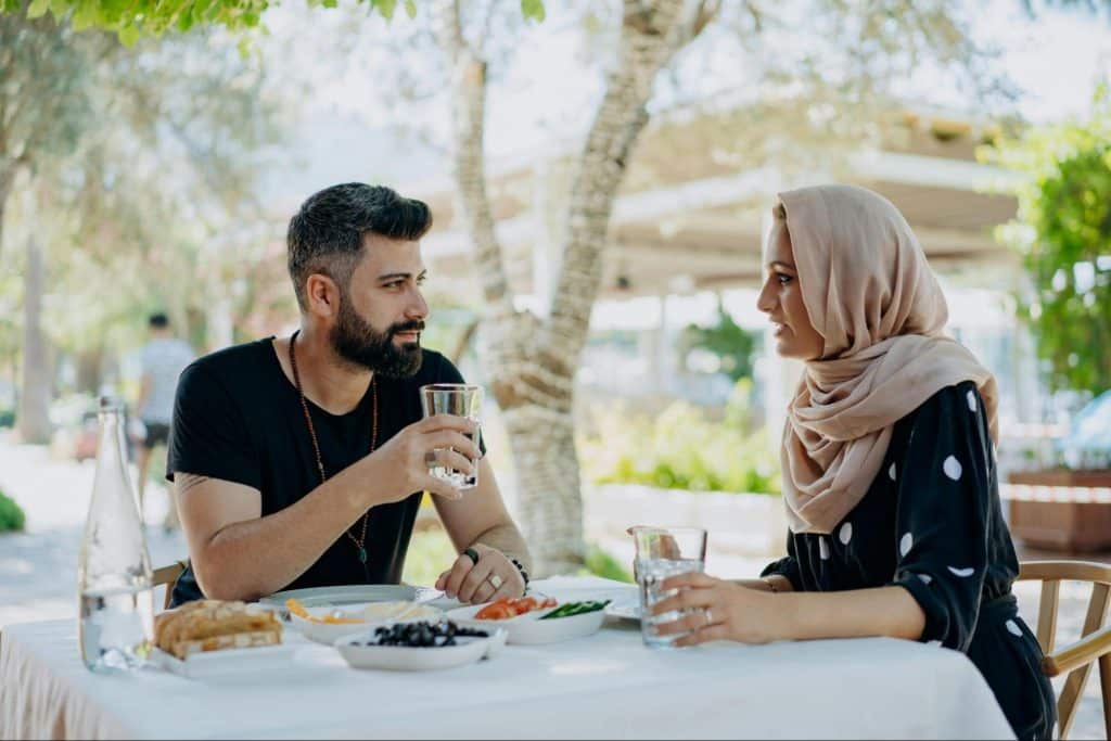 Woman communicating with a man