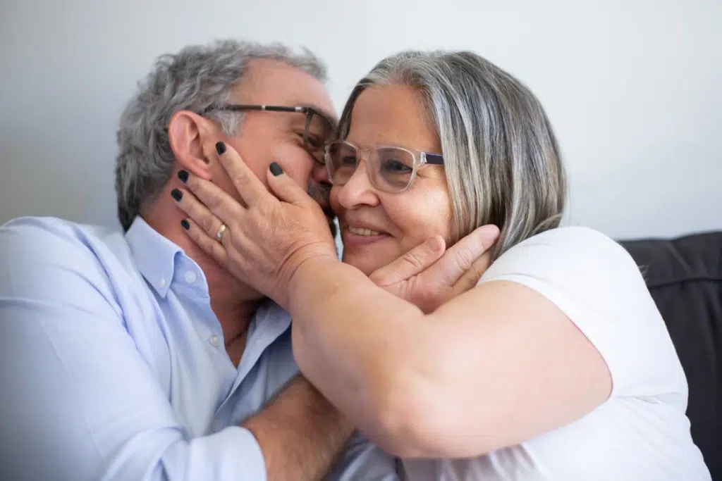 A couple holding each other