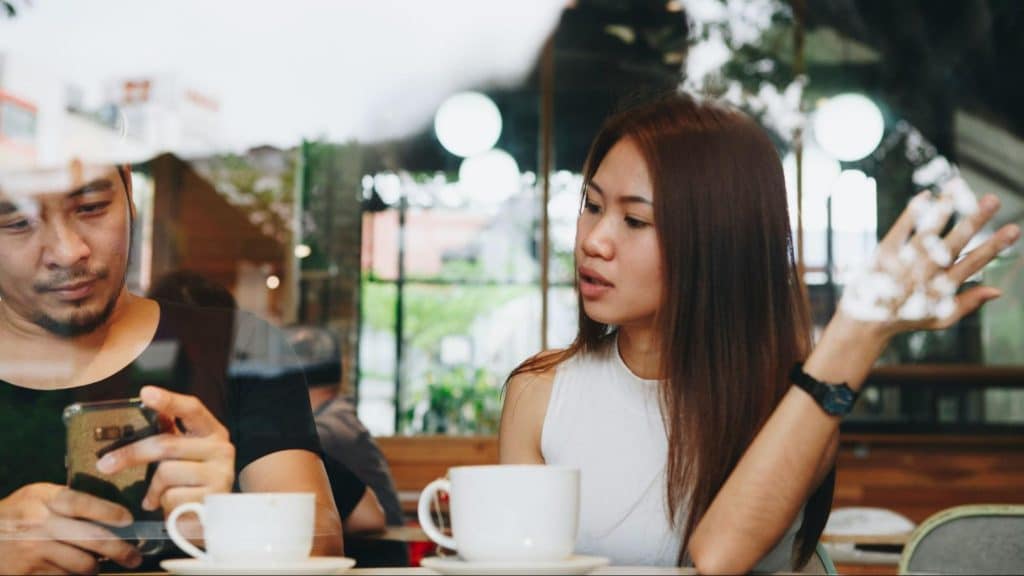 A man ignoring a woman