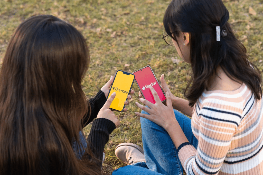 Two Women Exploring Bumble and Tinder Outdoors