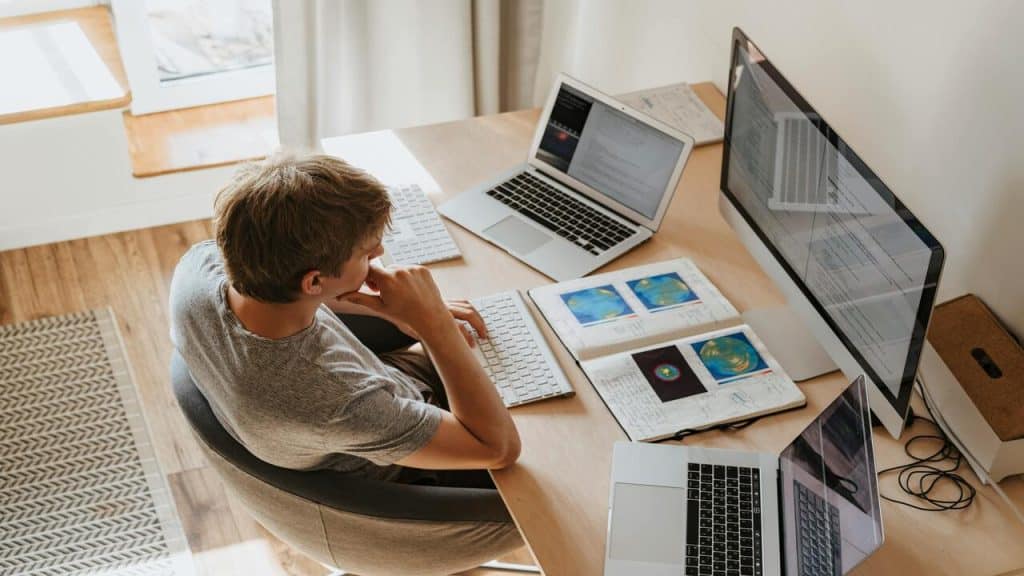 A man using multiple devices