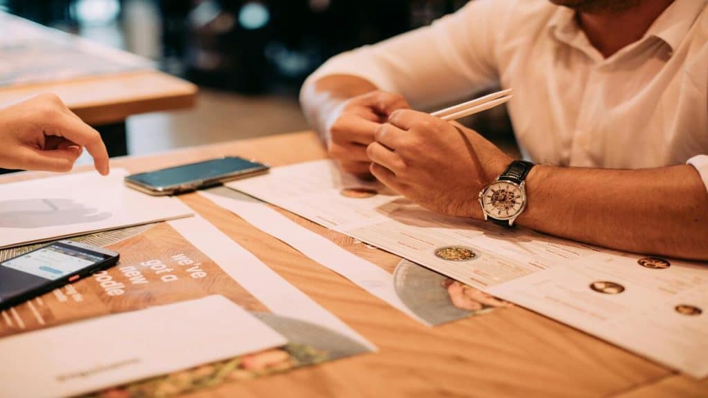 A couple looking at the menu