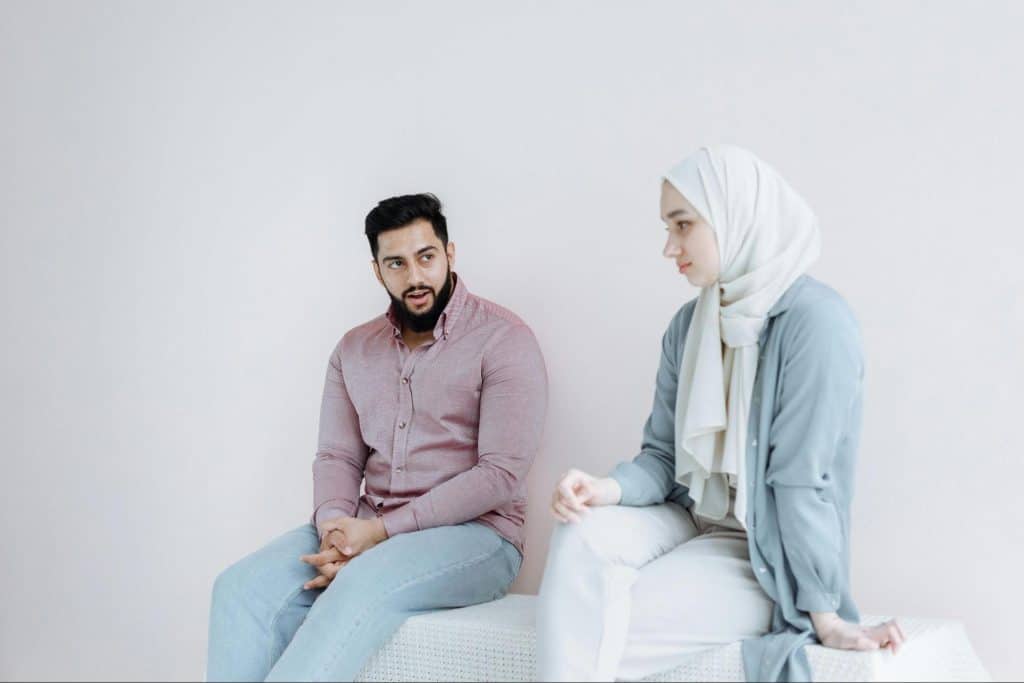 A man looking at the woman