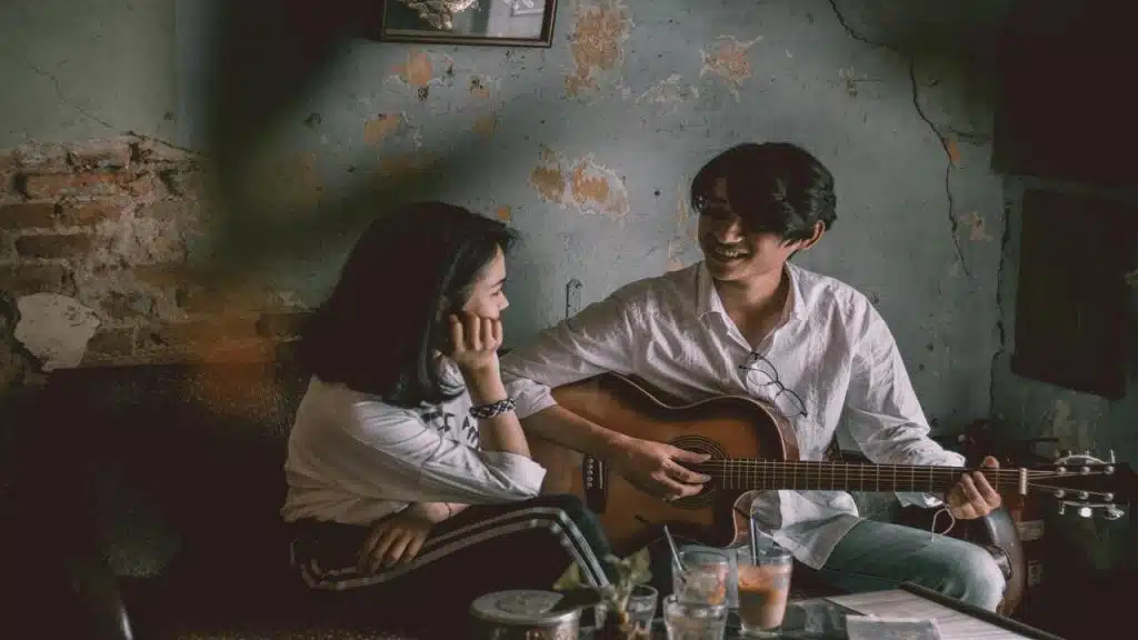 A man serenading a girl