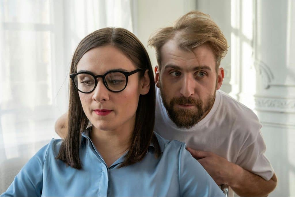 A man close to woman