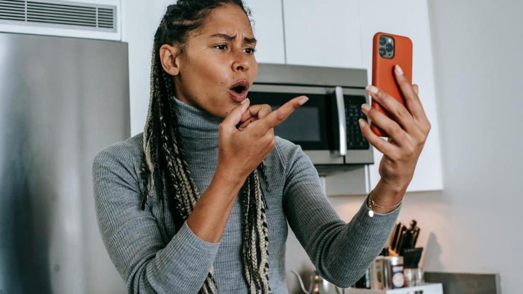 A woman reacting angrily