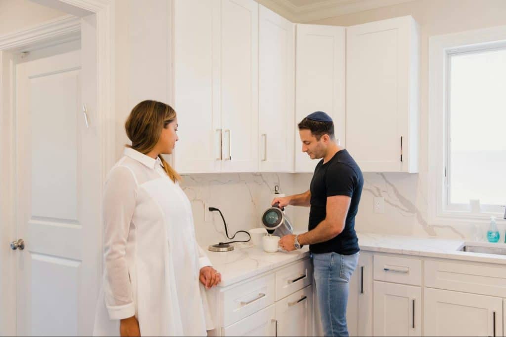 Woman observing a man