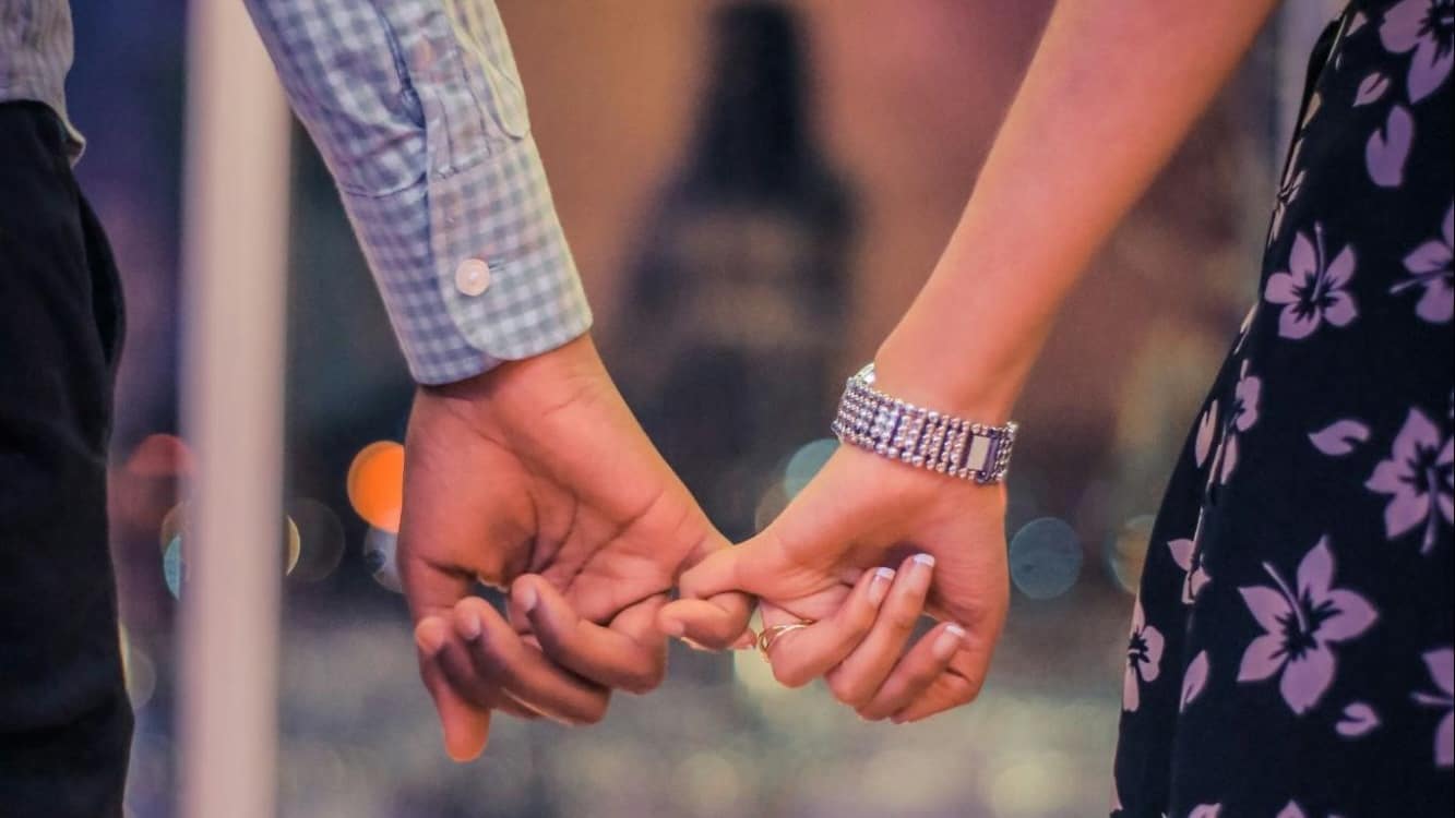 couple holding hands