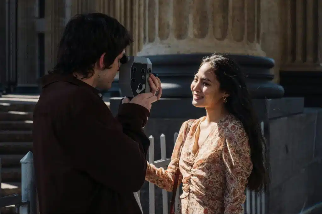 A man taking a picture of a woman