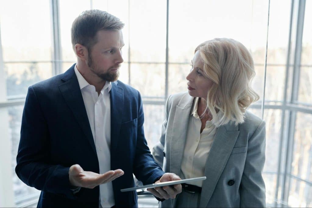 Woman questioning a man