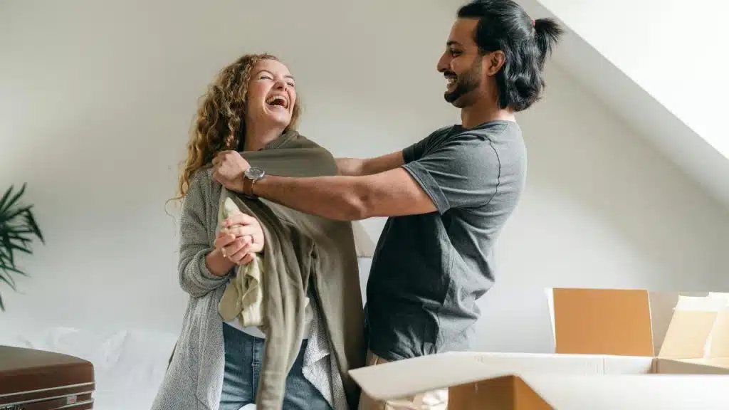 A couple laughing together 
