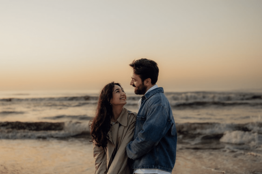 Romantic Couple Embracing at Sunset Beach