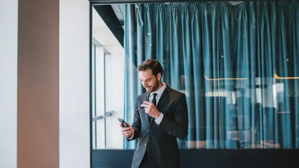Man sending a thoughtful check-in text to his partner