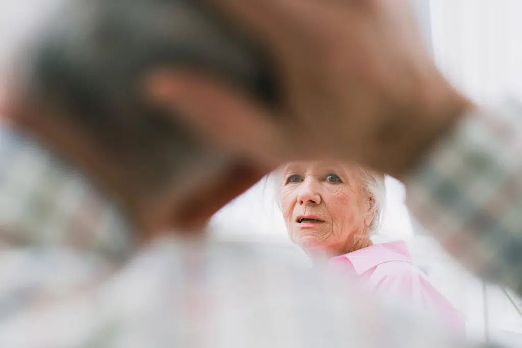 A man looking at a woman
